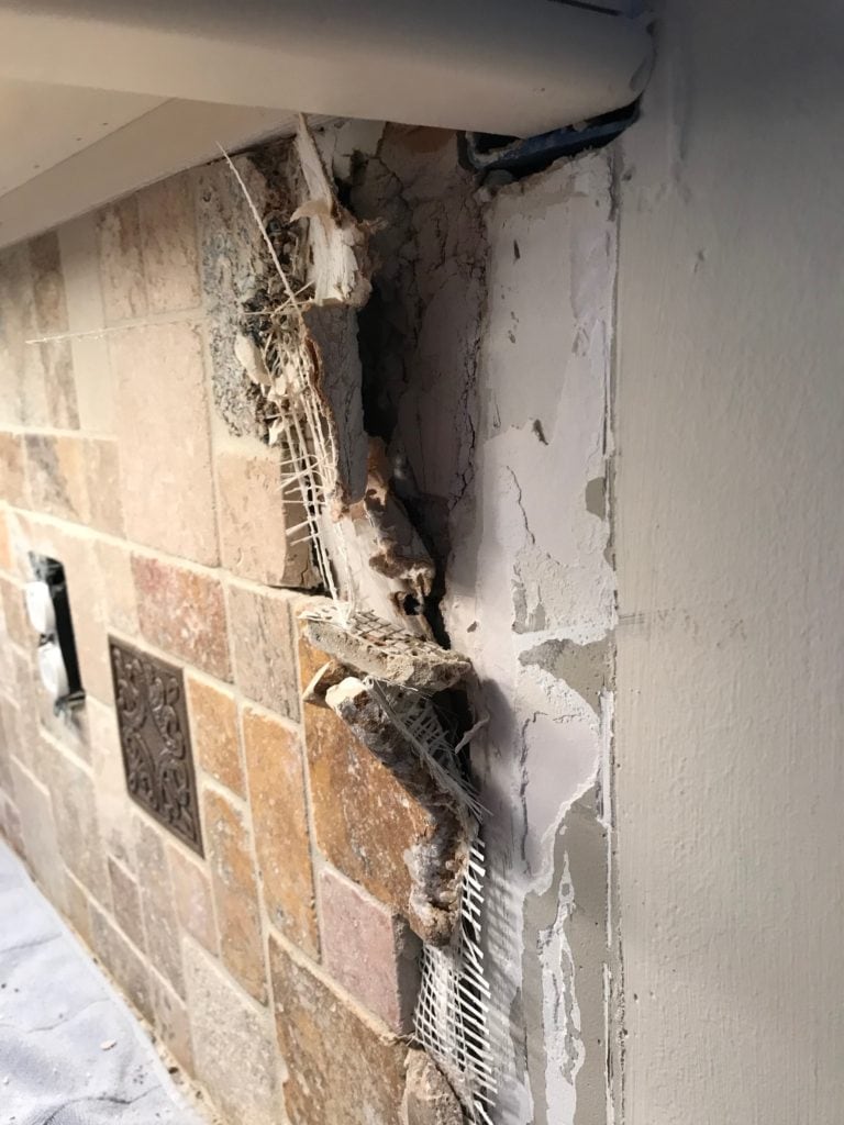 Removing existing backsplash can be challenging